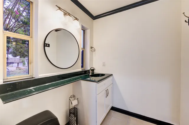 a view of a fence and trees