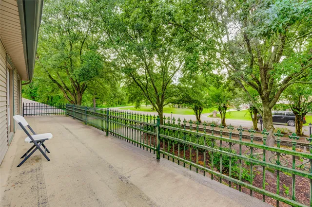 a view of a house with a street