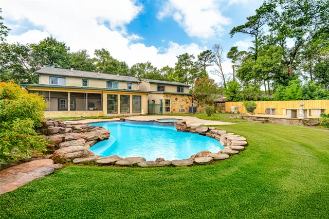 front view of a house with a swimming pool