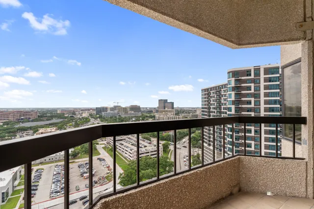 a view of city from a balcony