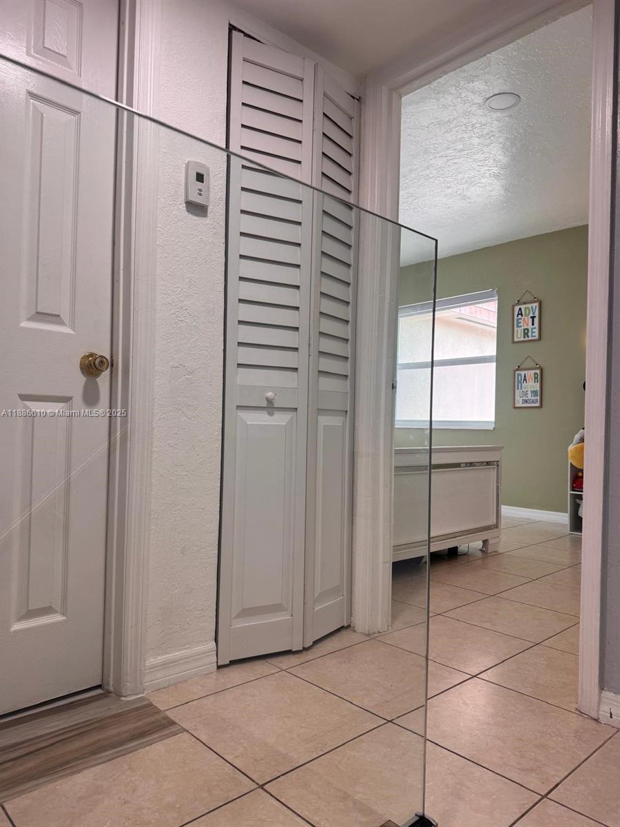 1560 West 46th Street, Unit 236 Hialeah, FL 33012 - Photo 6 of 19 a bathroom with a shower and a sink