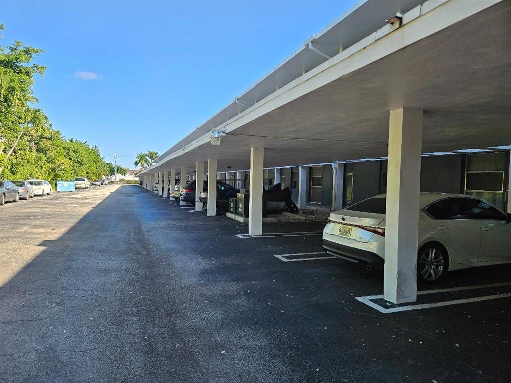 777 Southeast 2nd Avenue, Unit D123 Deerfield Beach, FL 33441 - Photo 18 of 36 a view of back yard of the house