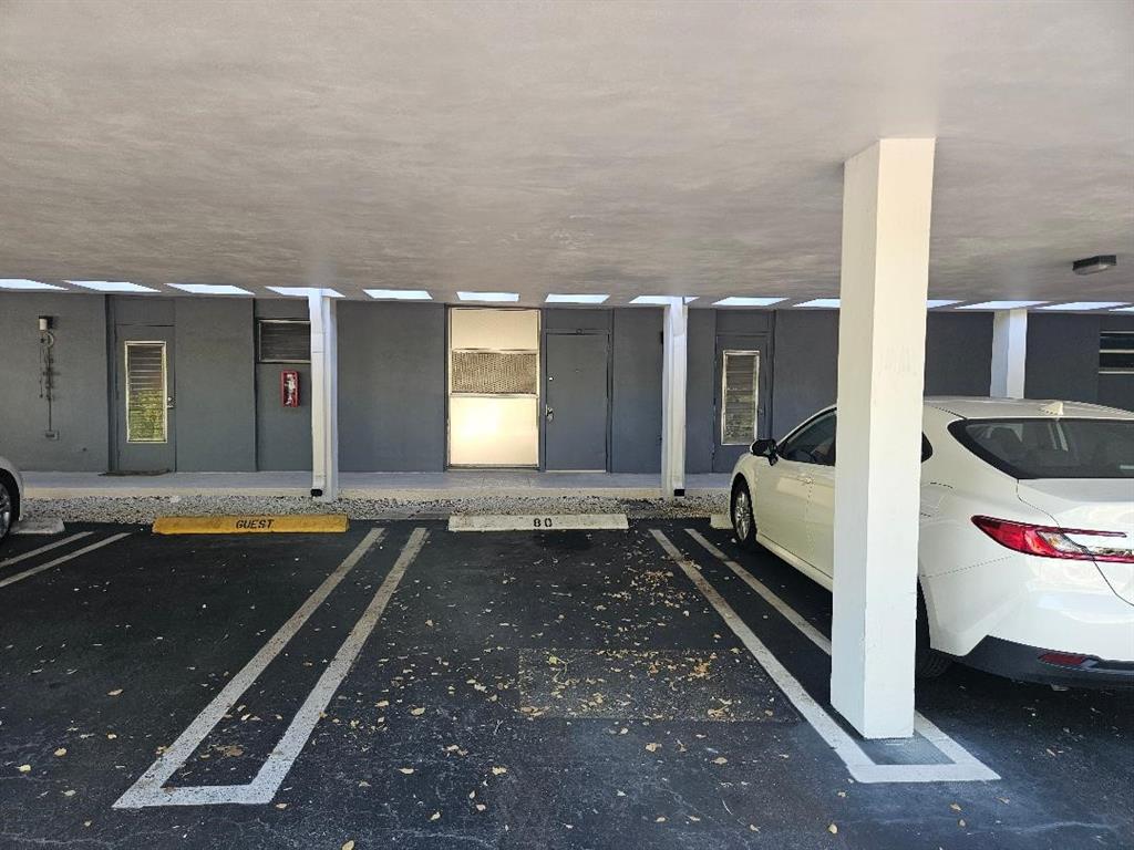 777 Southeast 2nd Avenue, Unit D123 Deerfield Beach, FL 33441 - Photo 19 of 36 a bathroom with a tub and a sink