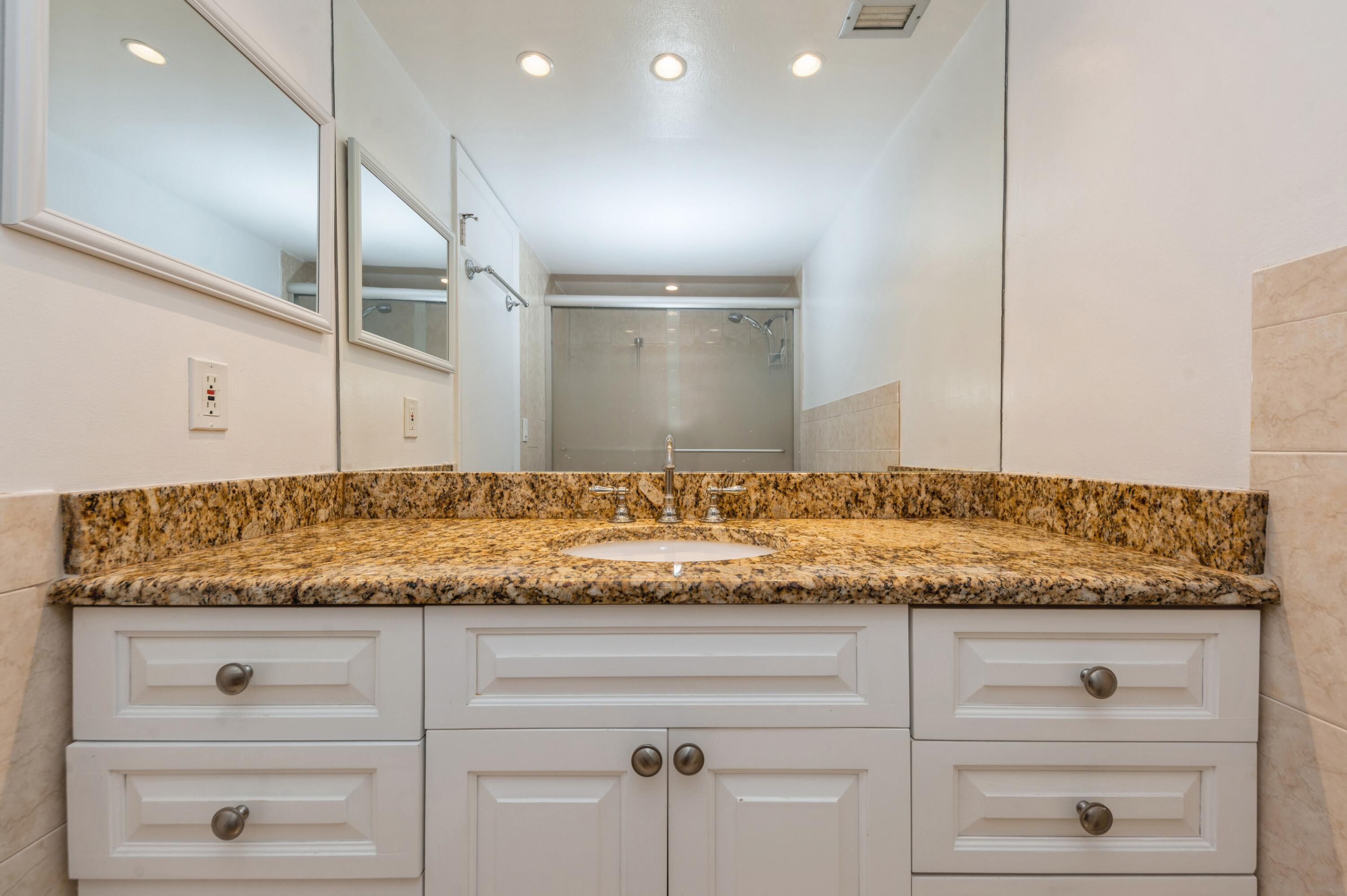 5500 Northwest 2nd Avenue, Unit 324 Boca Raton, FL 33487 - Photo 11 of 17 11_5500-NW-2nd-Ave_Apt-324_Primary-Bathr