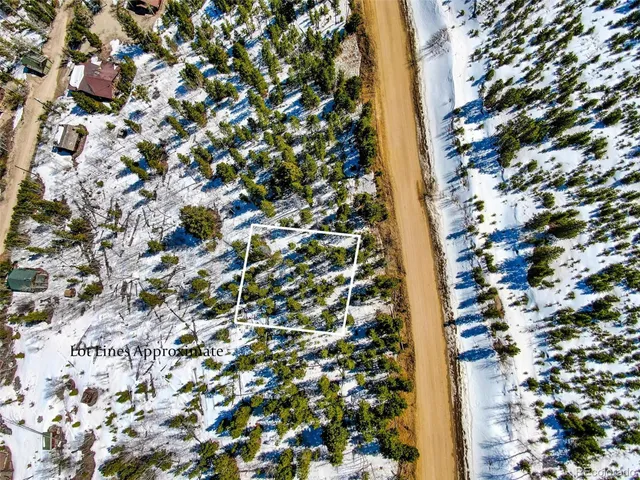 a view of a city with mountains in the background