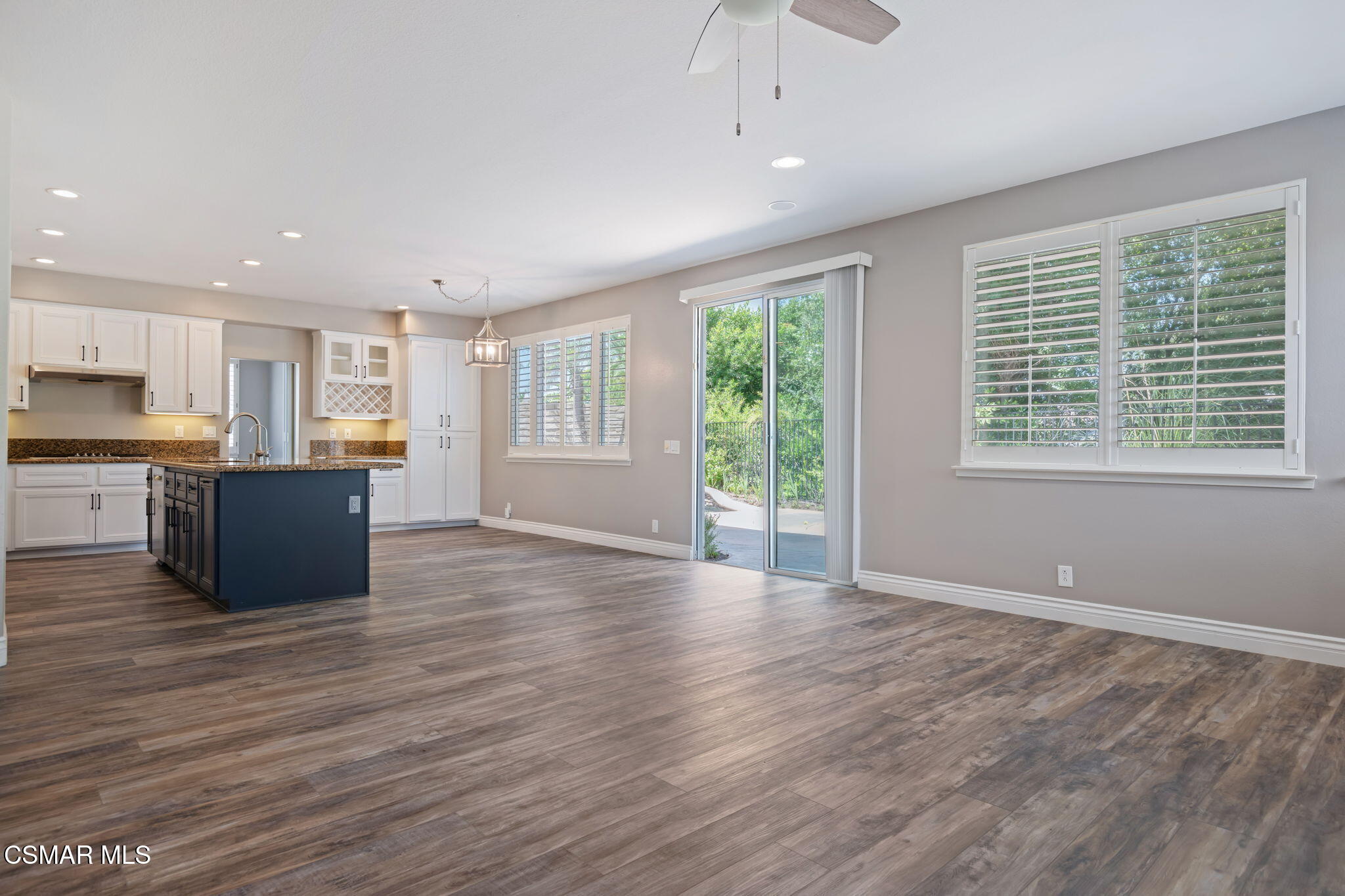 335 Kitetail Street Simi Valley, CA 93065 - Photo 12 of 53 a view of kitchen with wooden floor and window