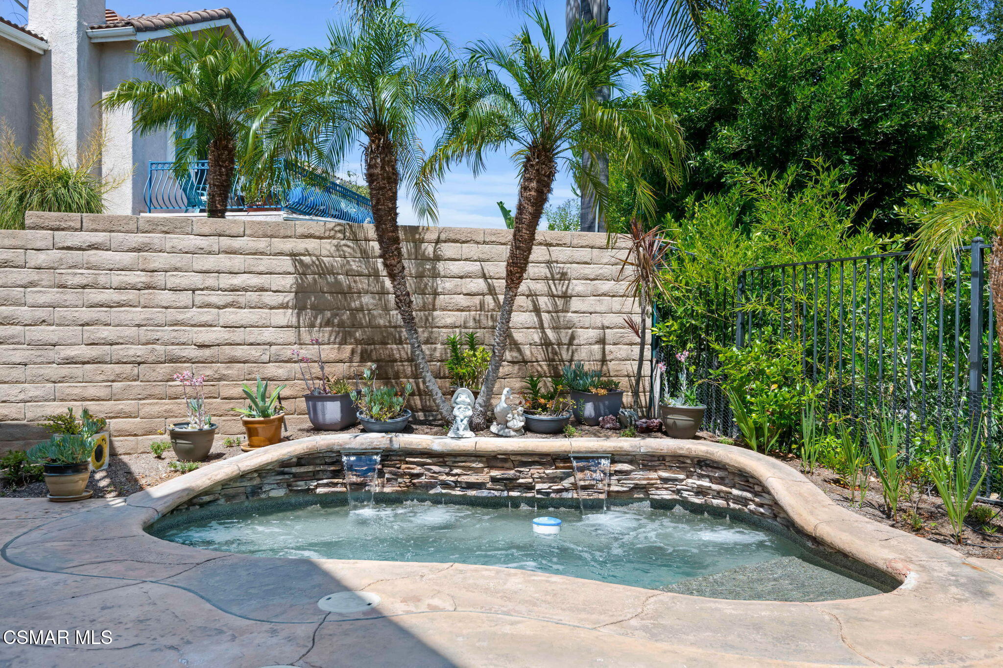 335 Kitetail Street Simi Valley, CA 93065 - Photo 21 of 53 a view of a swimming pool with a patio