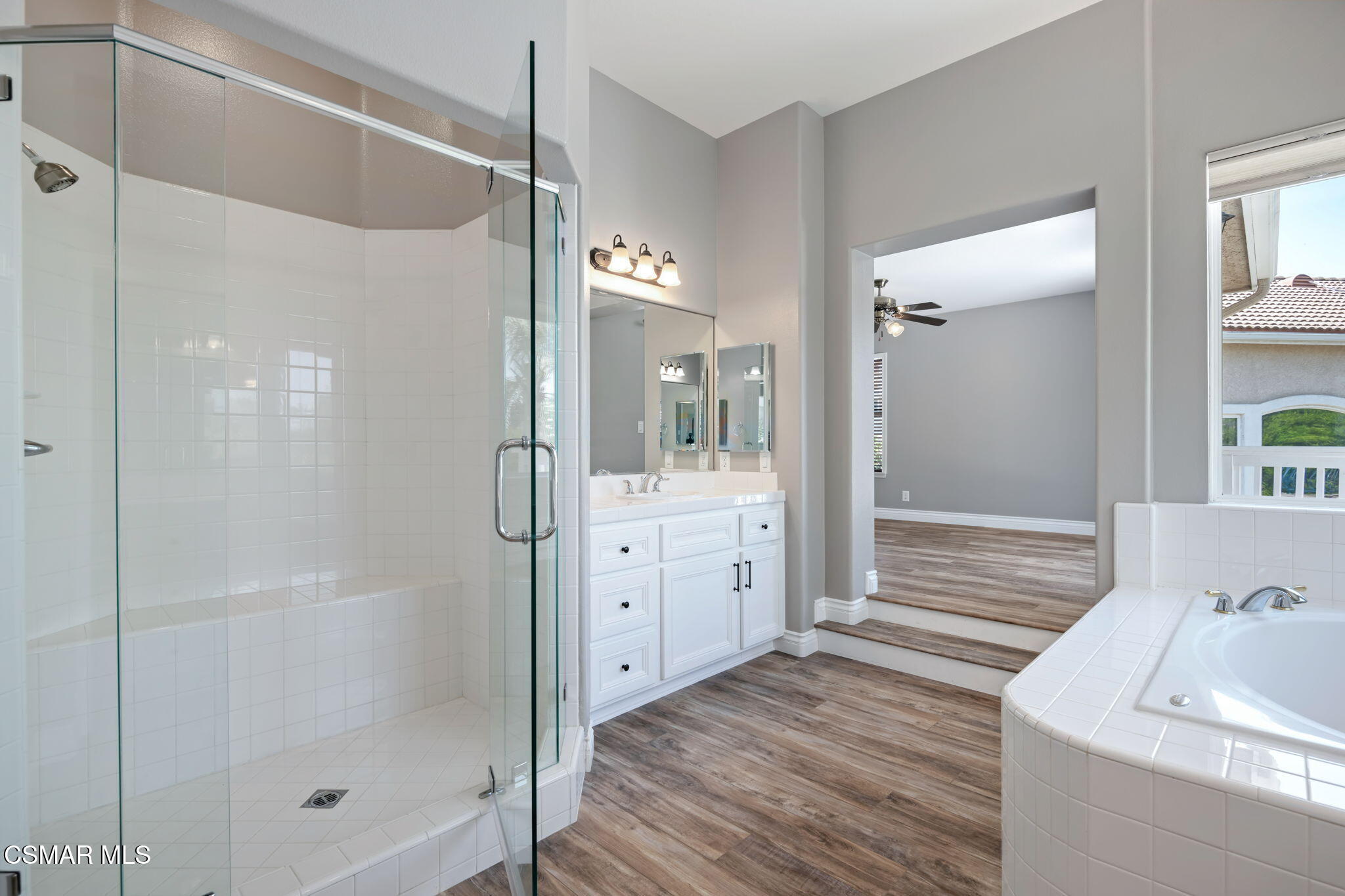 335 Kitetail Street Simi Valley, CA 93065 - Photo 30 of 53 a bathroom with a shower sink and mirror