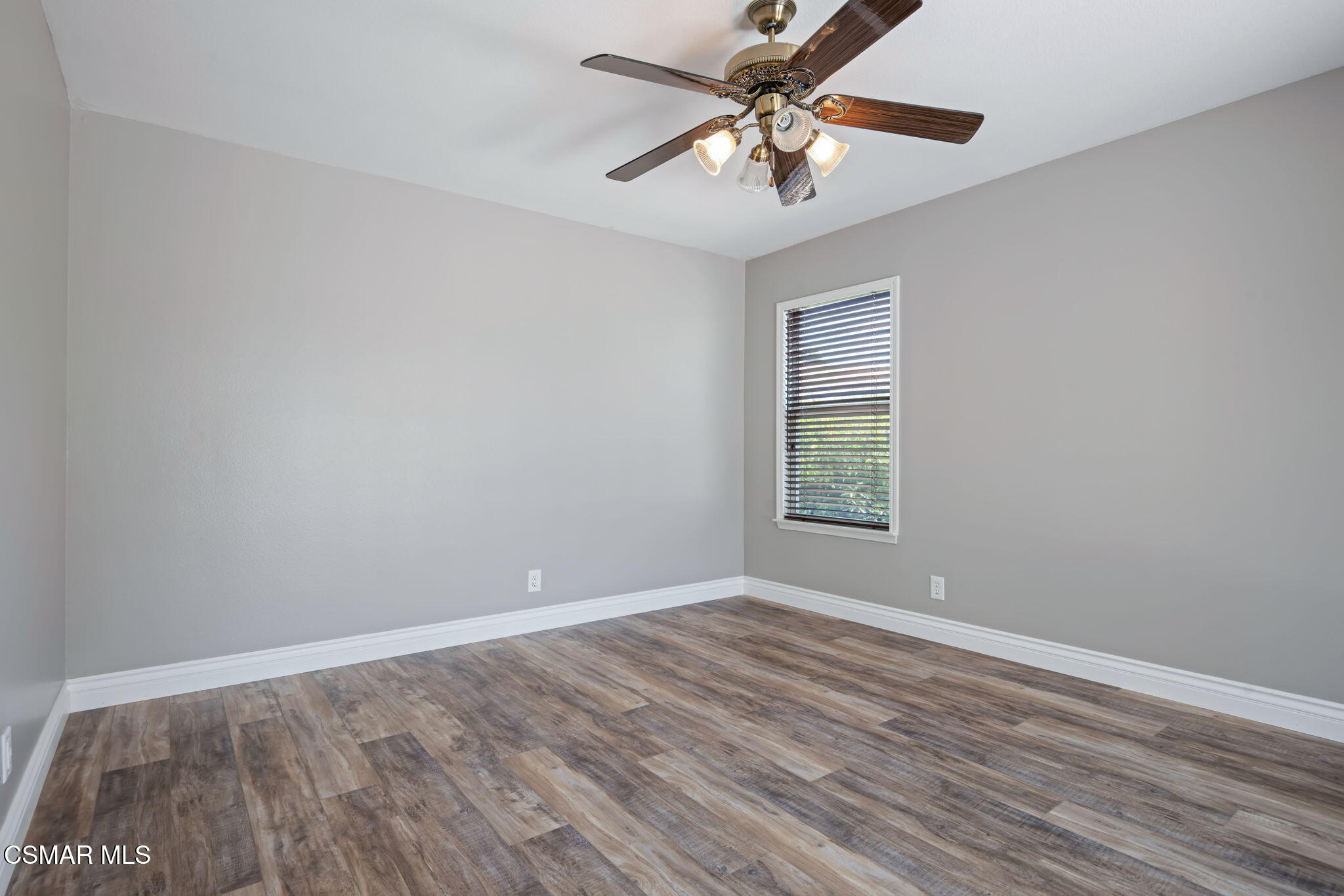 335 Kitetail Street Simi Valley, CA 93065 - Photo 32 of 53 wooden floor in an empty room with a window