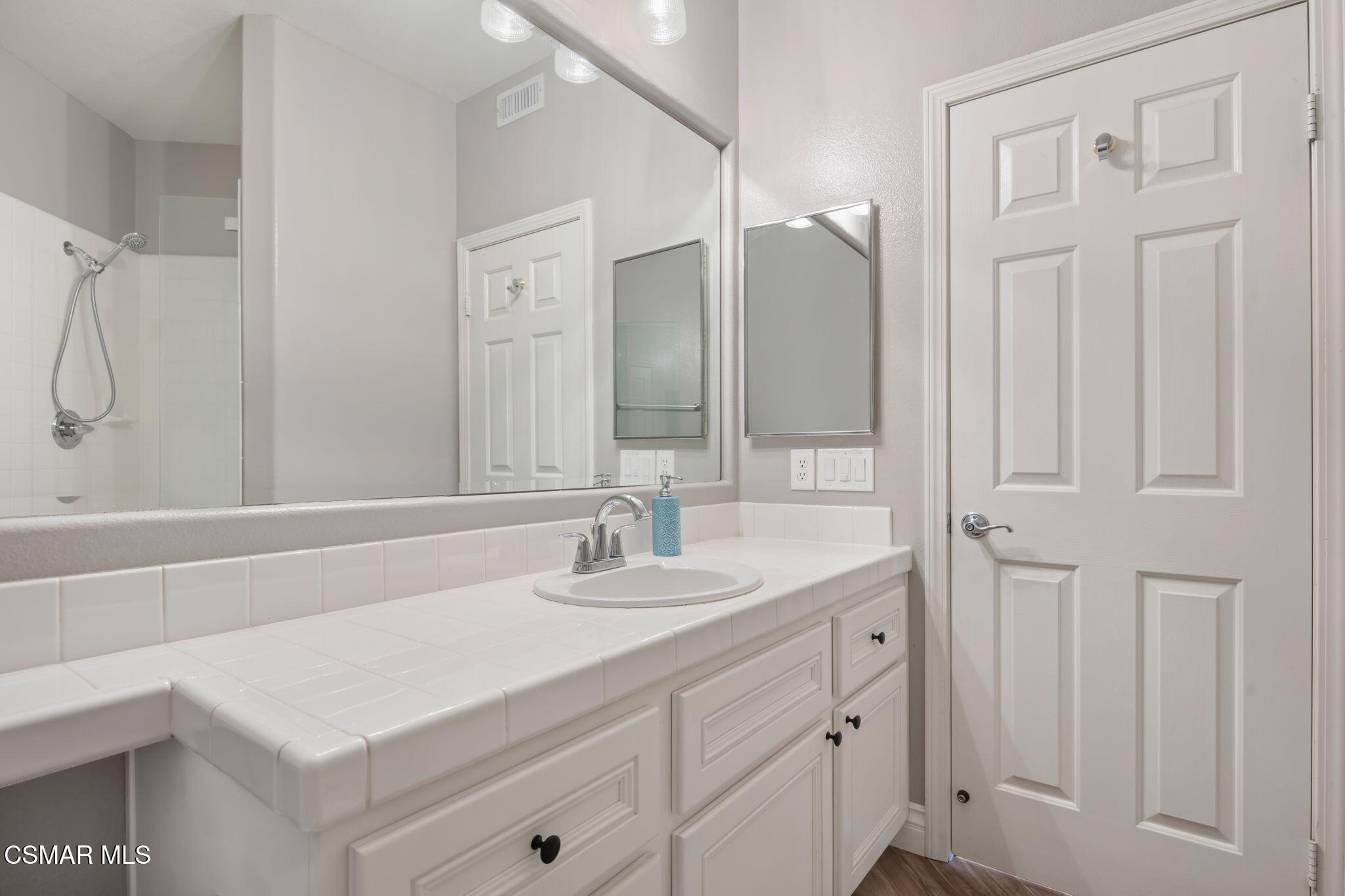 335 Kitetail Street Simi Valley, CA 93065 - Photo 43 of 53 a bathroom with a sink double vanity and a mirror
