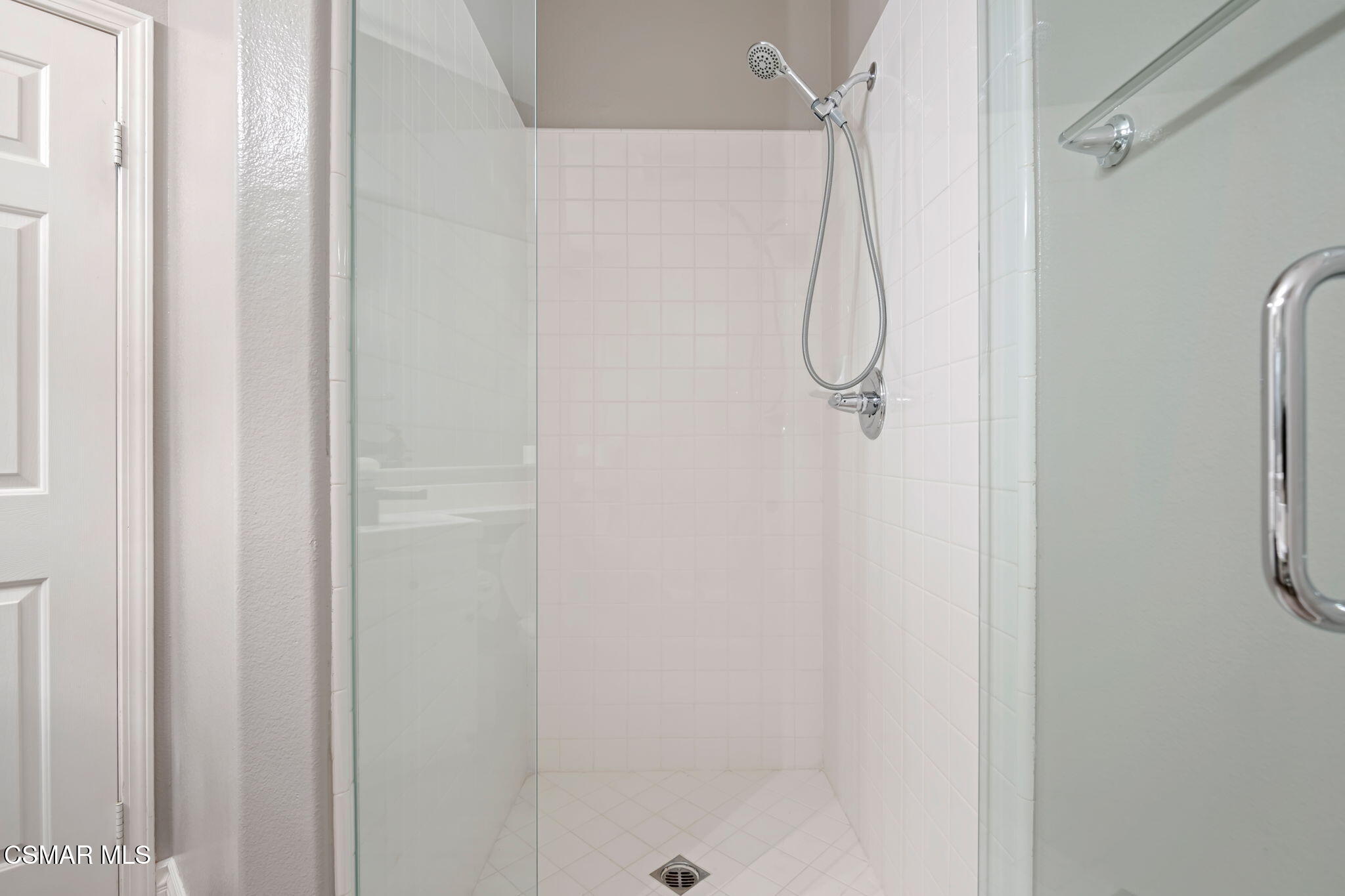 335 Kitetail Street Simi Valley, CA 93065 - Photo 44 of 53 a bathroom with a glass shower door