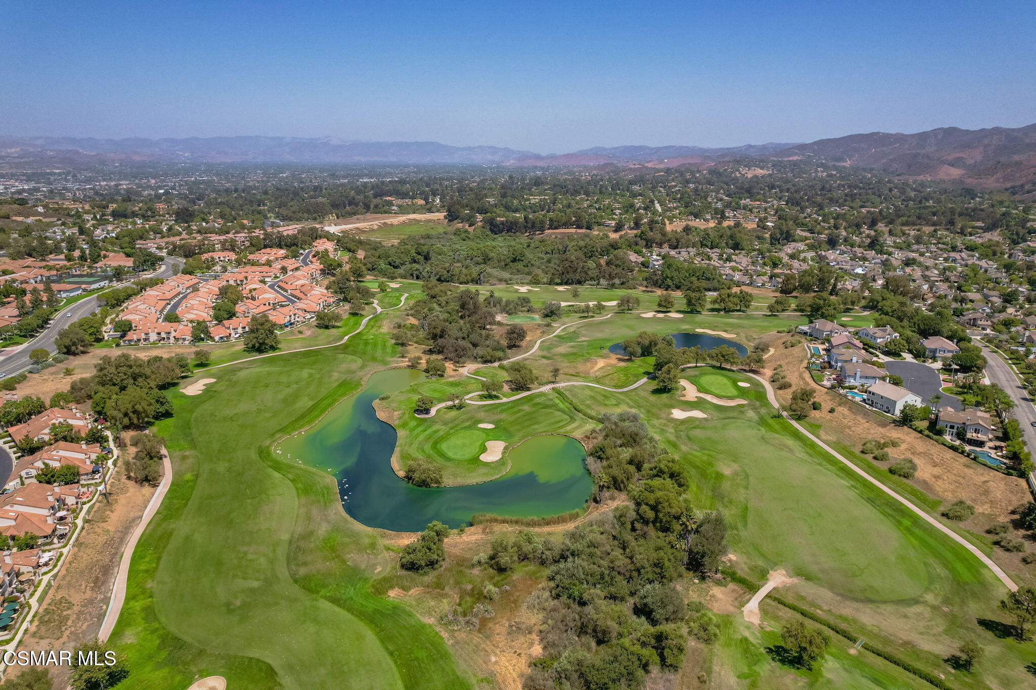 335 Kitetail Street Simi Valley, CA 93065 - Photo 51 of 53 a view of a lake with a mountain