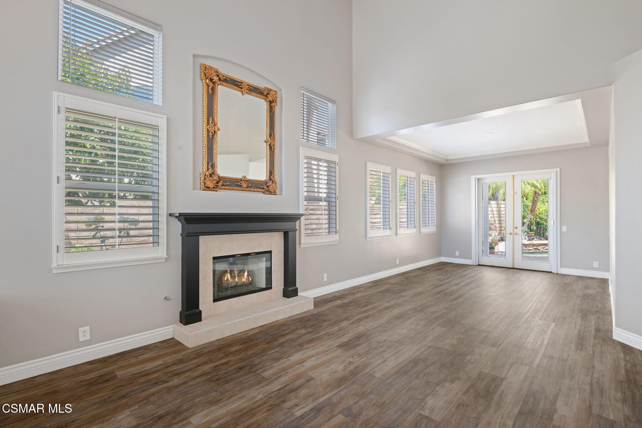 335 Kitetail Street Simi Valley, CA 93065 - Photo 8 of 53 wooden floor fireplace and windows in an empty room
