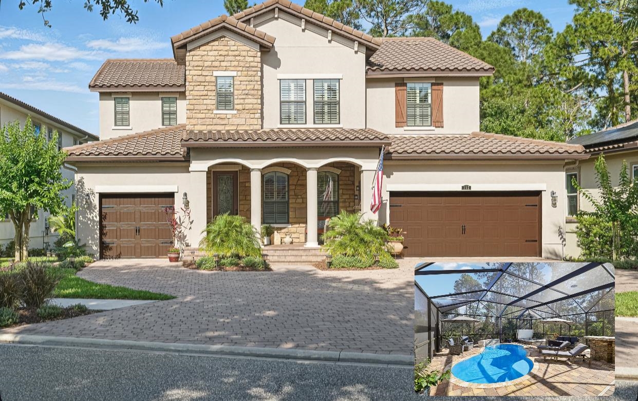 a front view of a house with yard and outdoor seating