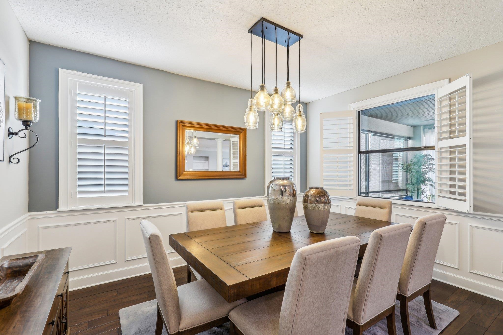 152 Spanish Marsh Drive St. Augustine, FL 32095 - Photo 11 of 63 a view of a dining room with furniture window and outside view