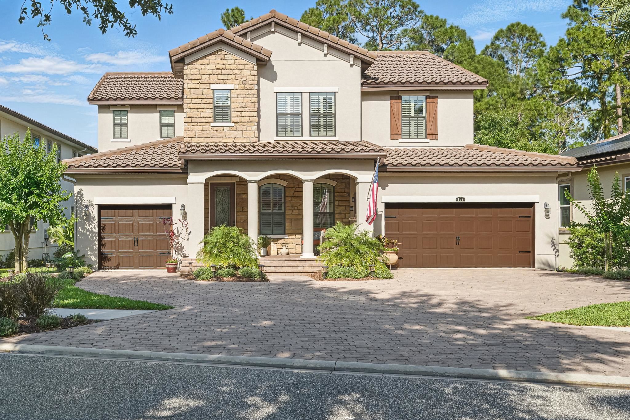 152 Spanish Marsh Drive St. Augustine, FL 32095 - Photo 48 of 63 front view of a house with a yard