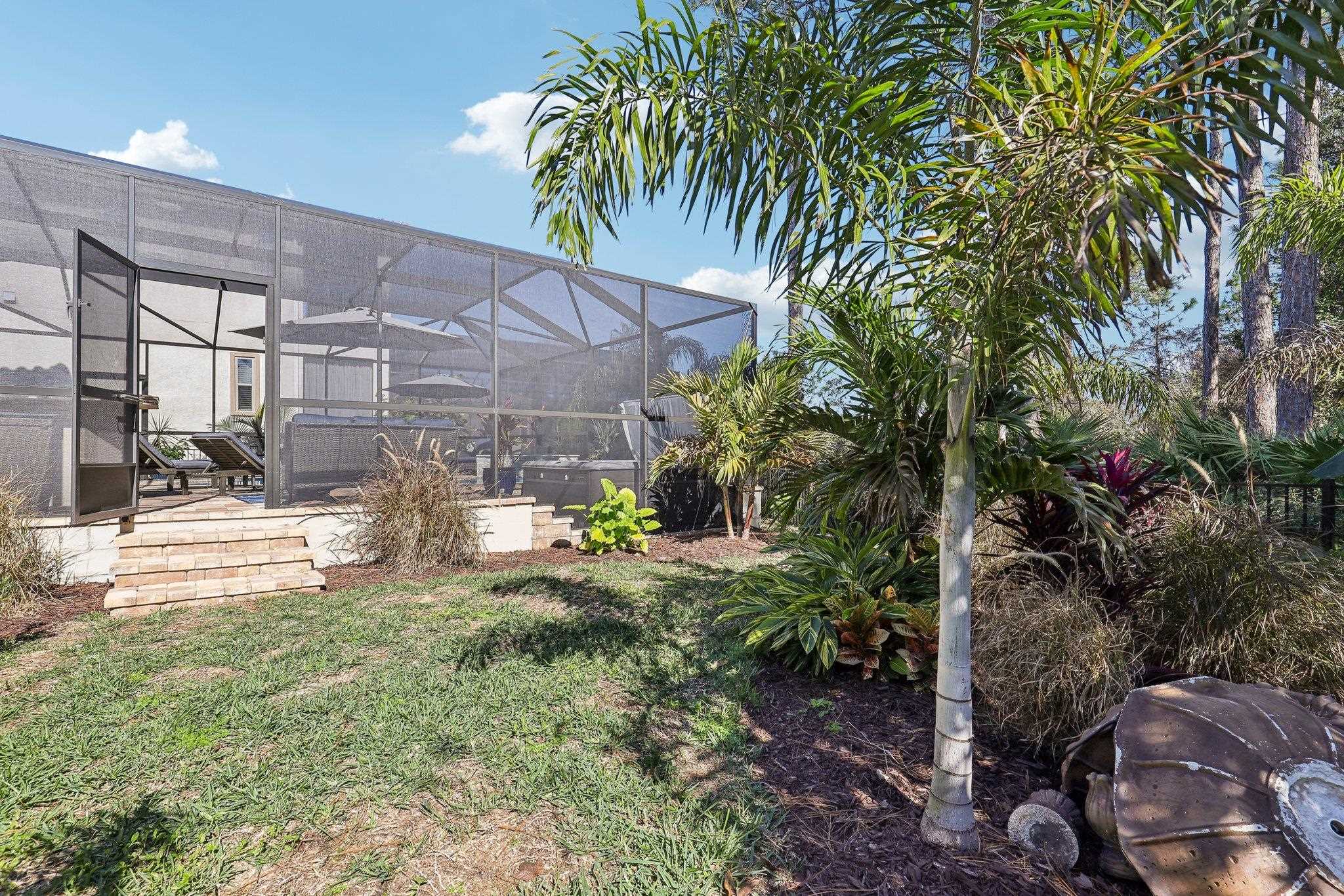 152 Spanish Marsh Drive St. Augustine, FL 32095 - Photo 57 of 63 a view of a backyard