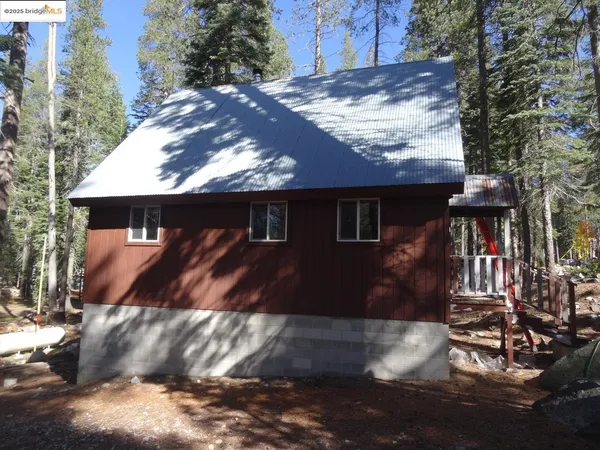 a front view of house with a yard