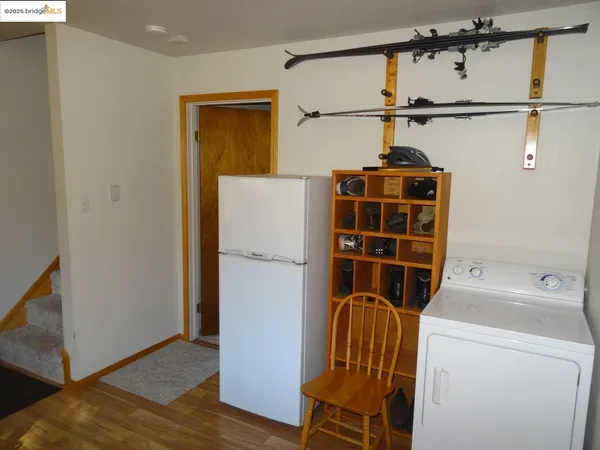 a view of a storage & utility room with washer and dryer
