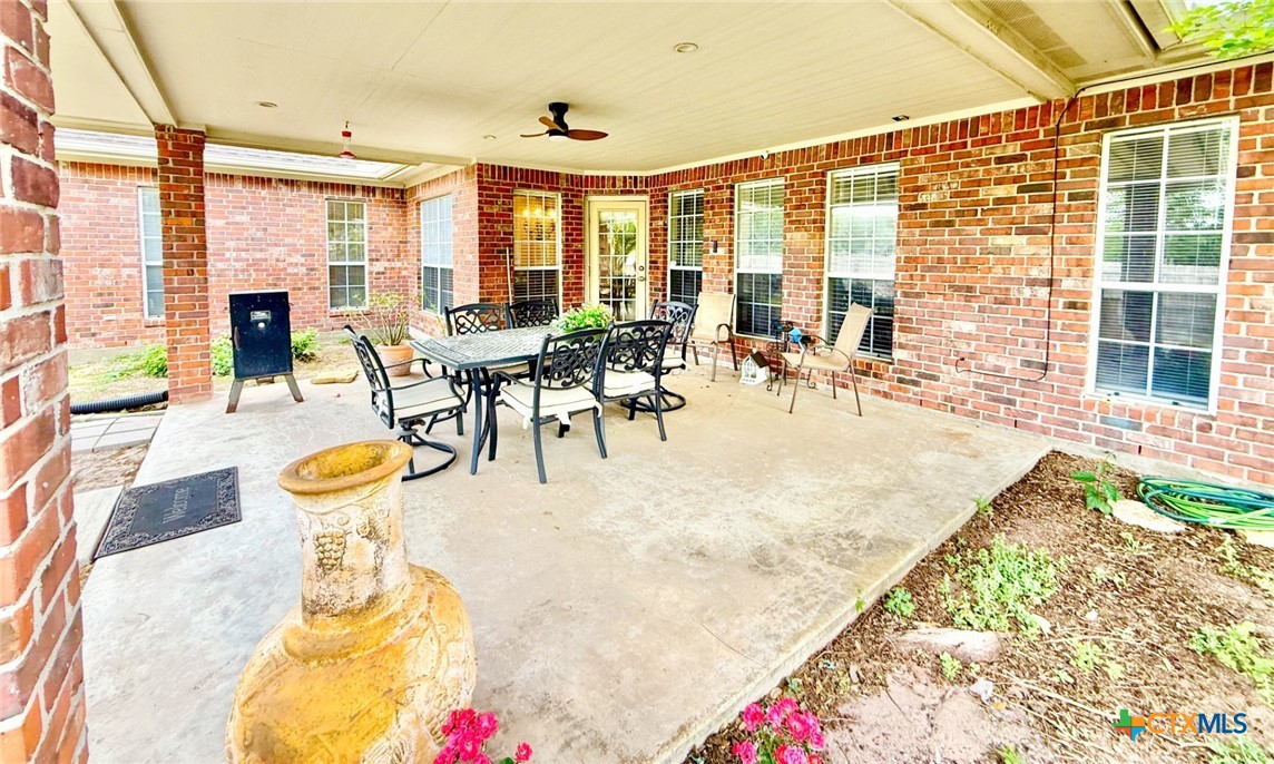 415 South Trinity Street Edna, TX 77957 - Photo 44 of 46 a dining room with furniture and a large window