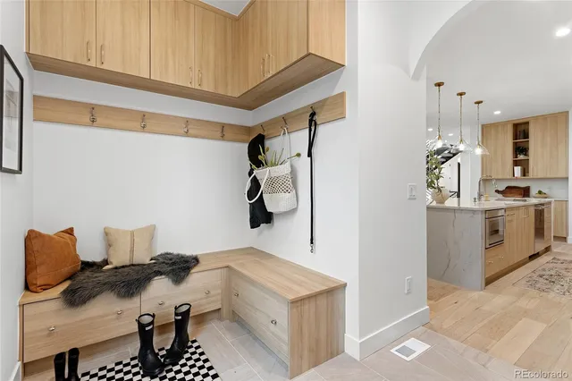 a room that has a bed and a table in it