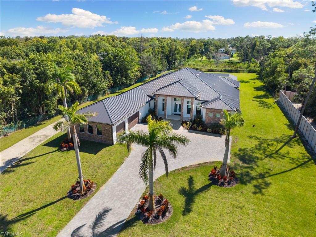 7040 Sable Ridge Lane Naples, FL 34109 - Photo 2 of 50