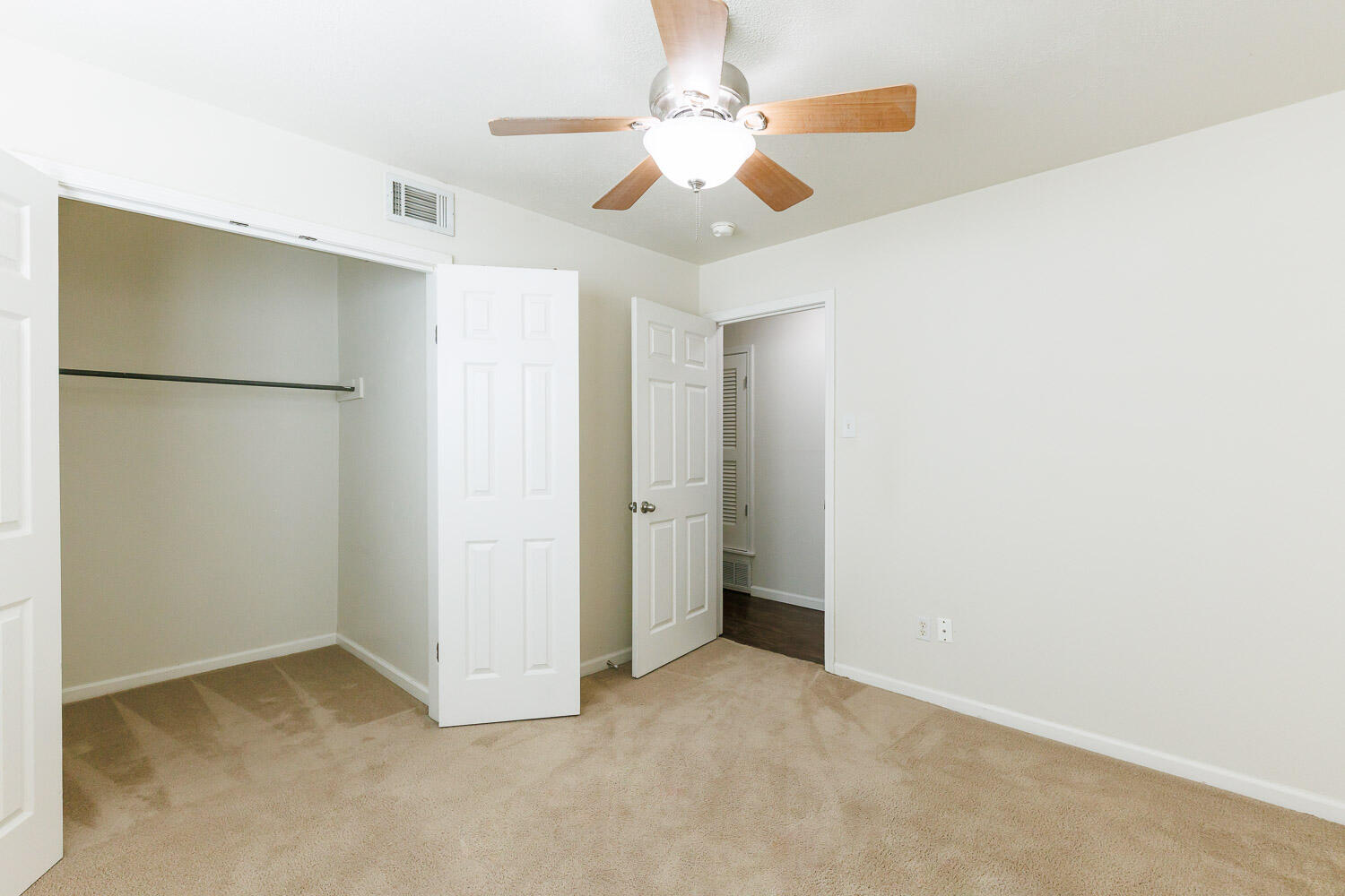 4816 45th Street Lubbock, TX 79414 - Photo 30 of 36 a view of an empty room with a ceiling fan
