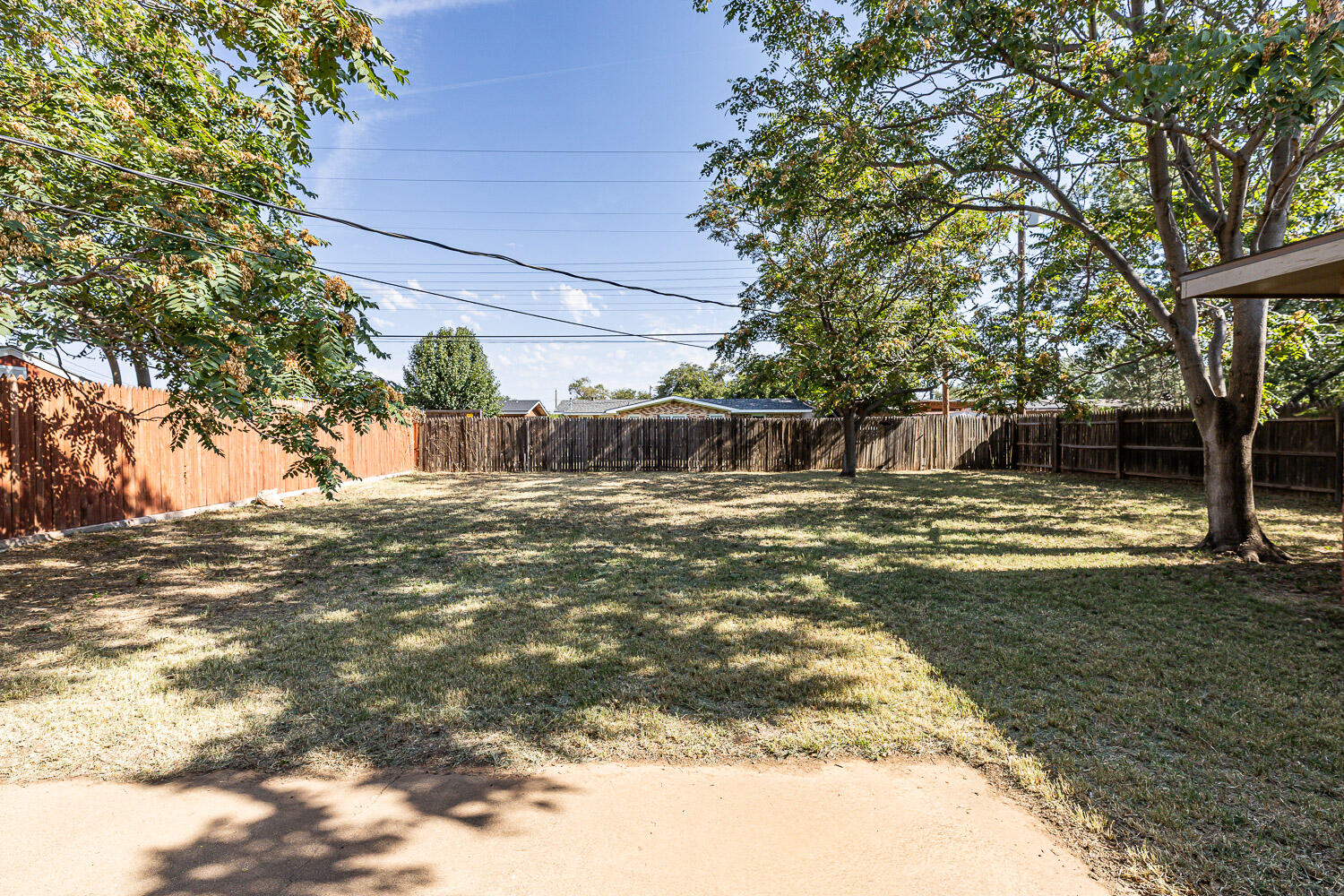 4816 45th Street Lubbock, TX 79414 - Photo 35 of 36 a view of a yard with a tree