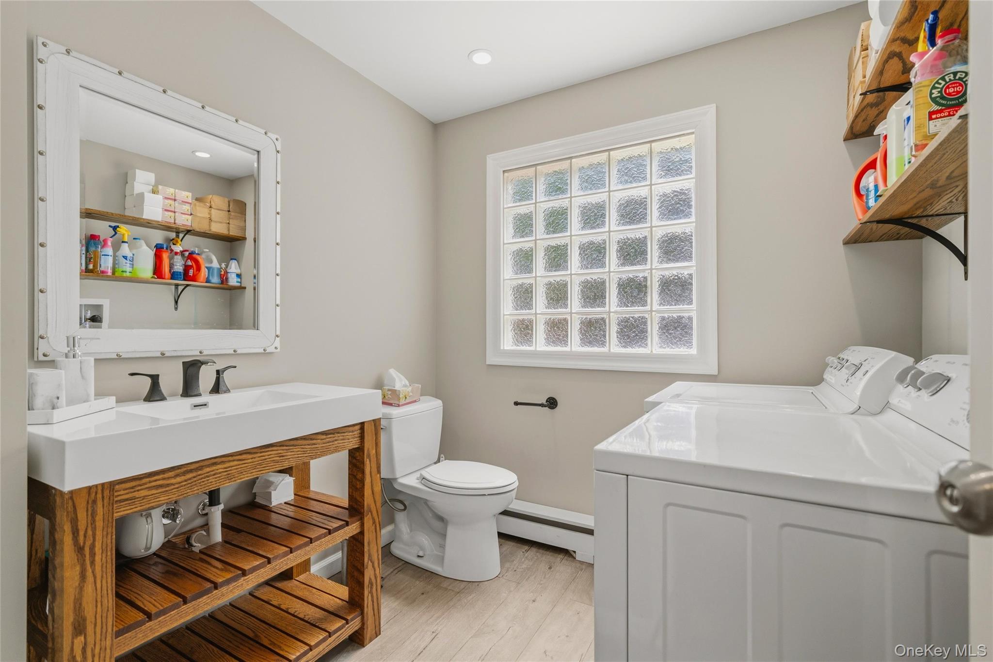 44 Sayer Road Blooming Grove, NY 10914 - Photo 19 of 39 a bathroom with a sink toilet and a window