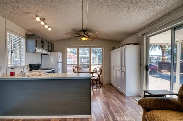 a view of a living room and a window