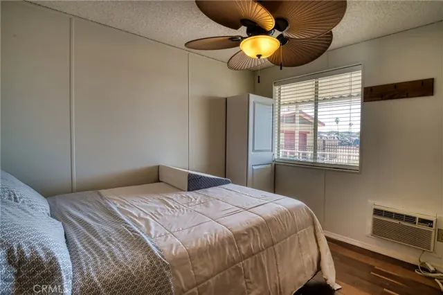 a view of a house with backyard and deck