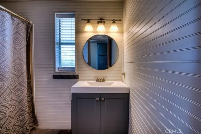 a red car parked in front of a house