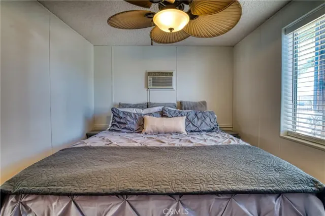 a view of a patio with swimming pool table and chairs