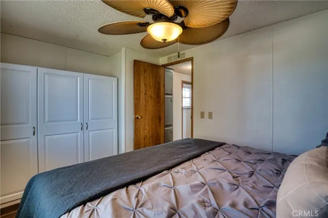 a view of a patio with a table and chairs