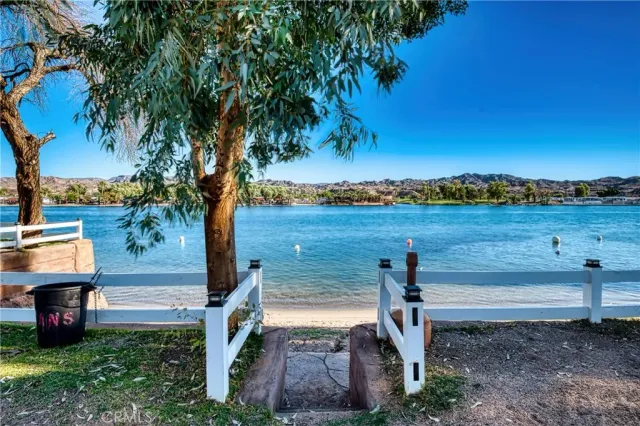a view of a lake with a city
