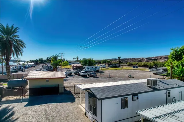 an aerial view of a city with ocean view