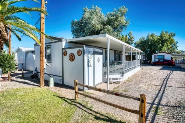 a lobby with furniture and a potted plant