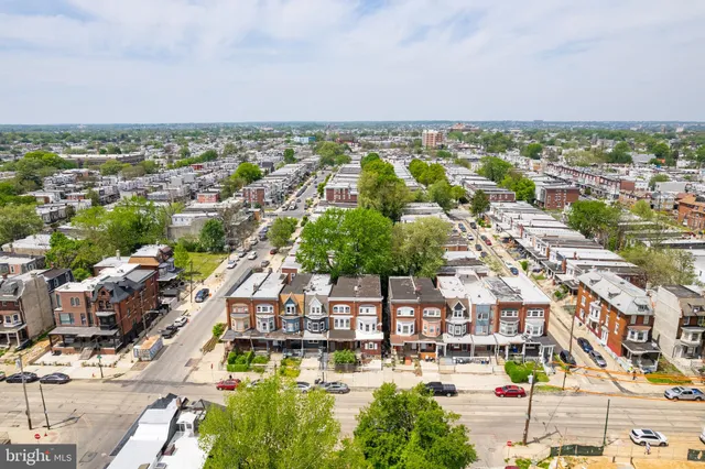 an aerial view of a city with lots of residential buildings