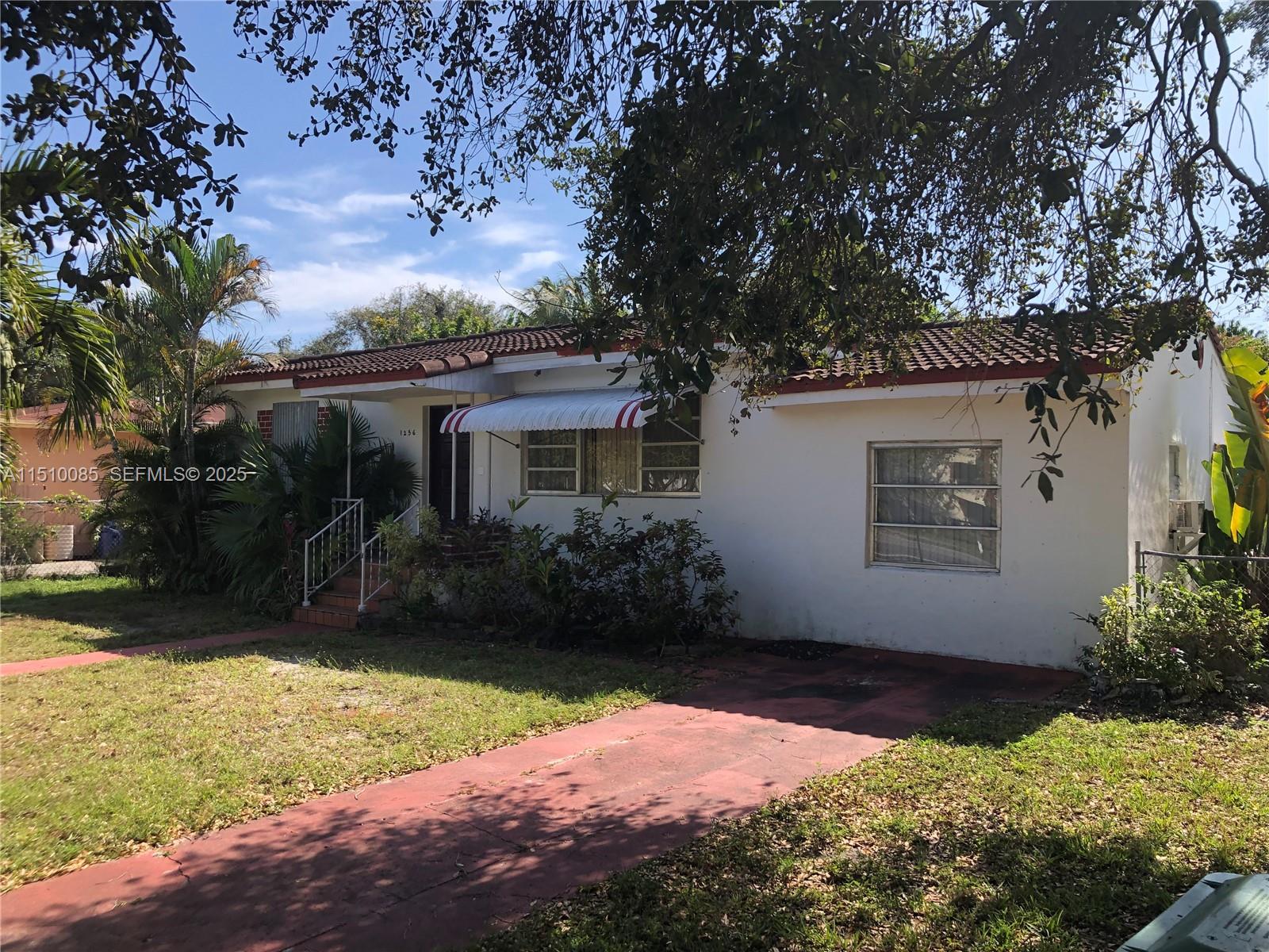 1256 Northeast 149th Street Miami, FL 33161 - Photo 2 of 24