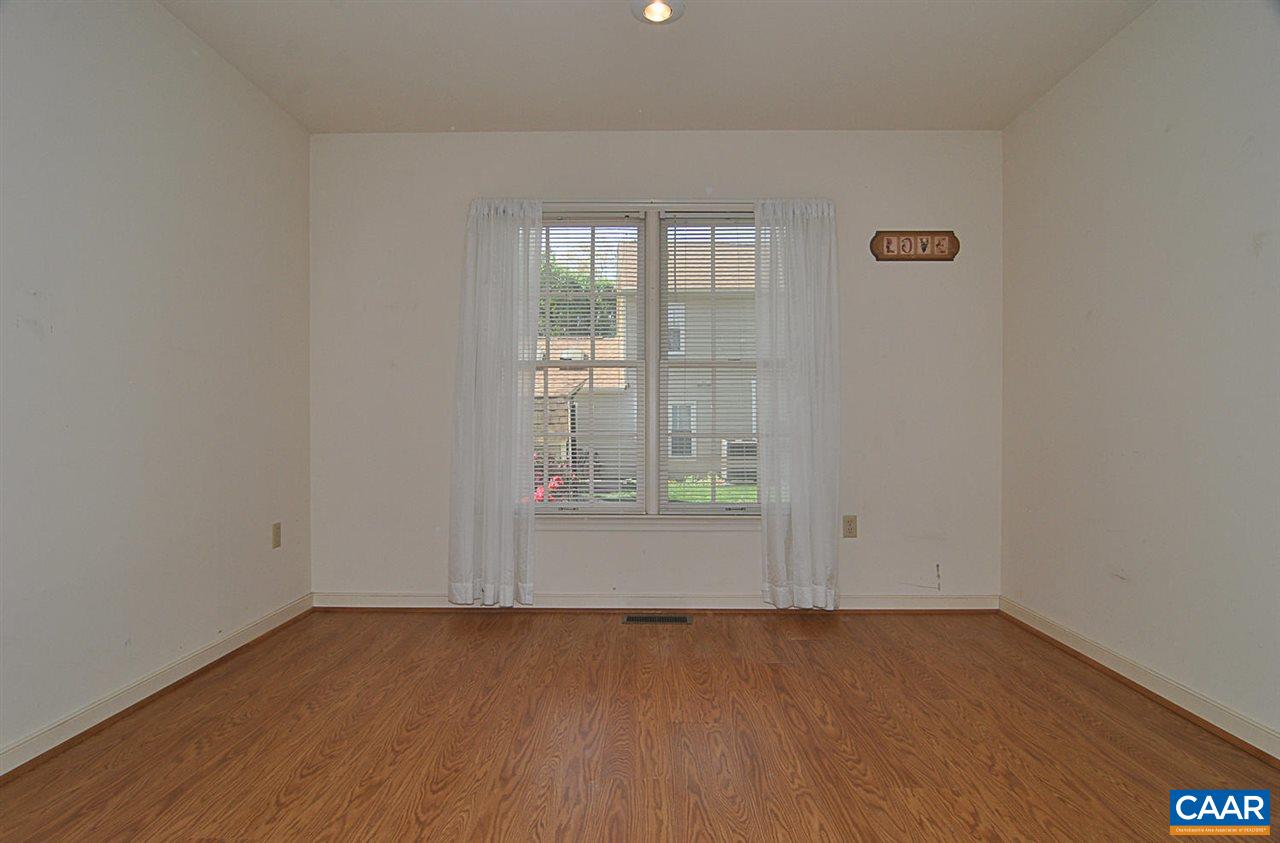 1576 Old Brook Road Charlottesville, VA 22901 - Photo 23 of 42 wooden floor and window in an empty room