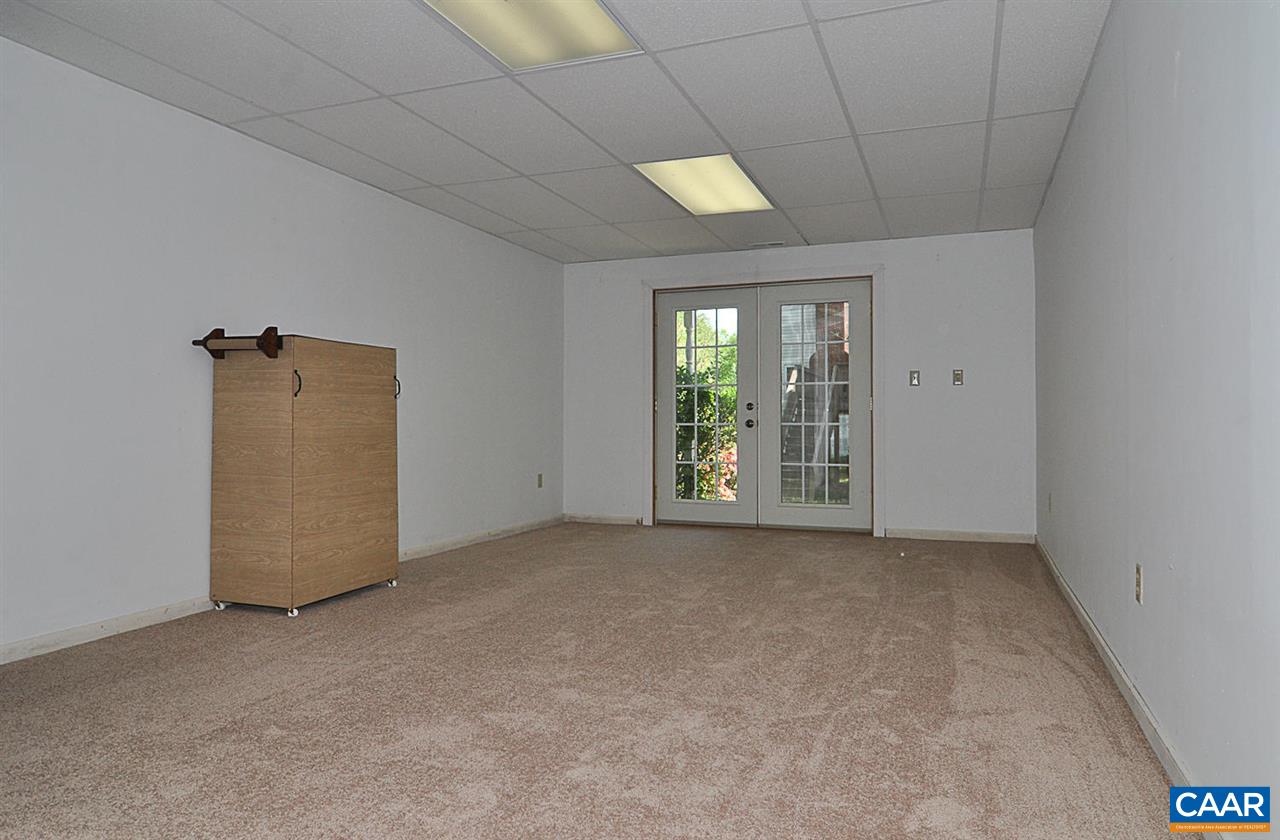 1576 Old Brook Road Charlottesville, VA 22901 - Photo 29 of 42 an empty room with windows