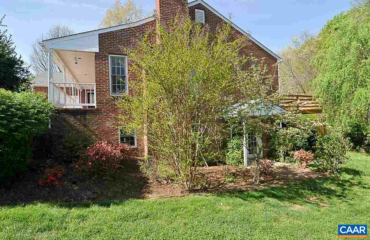 1576 Old Brook Road Charlottesville, VA 22901 - Photo 4 of 42 a front view of a house with garden