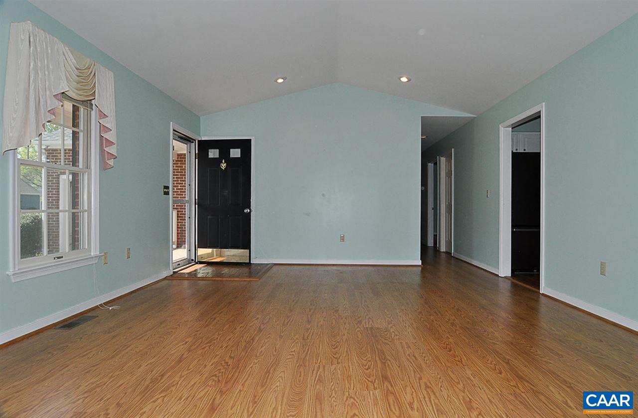 1576 Old Brook Road Charlottesville, VA 22901 - Photo 5 of 42 an empty room with wooden floor and windows