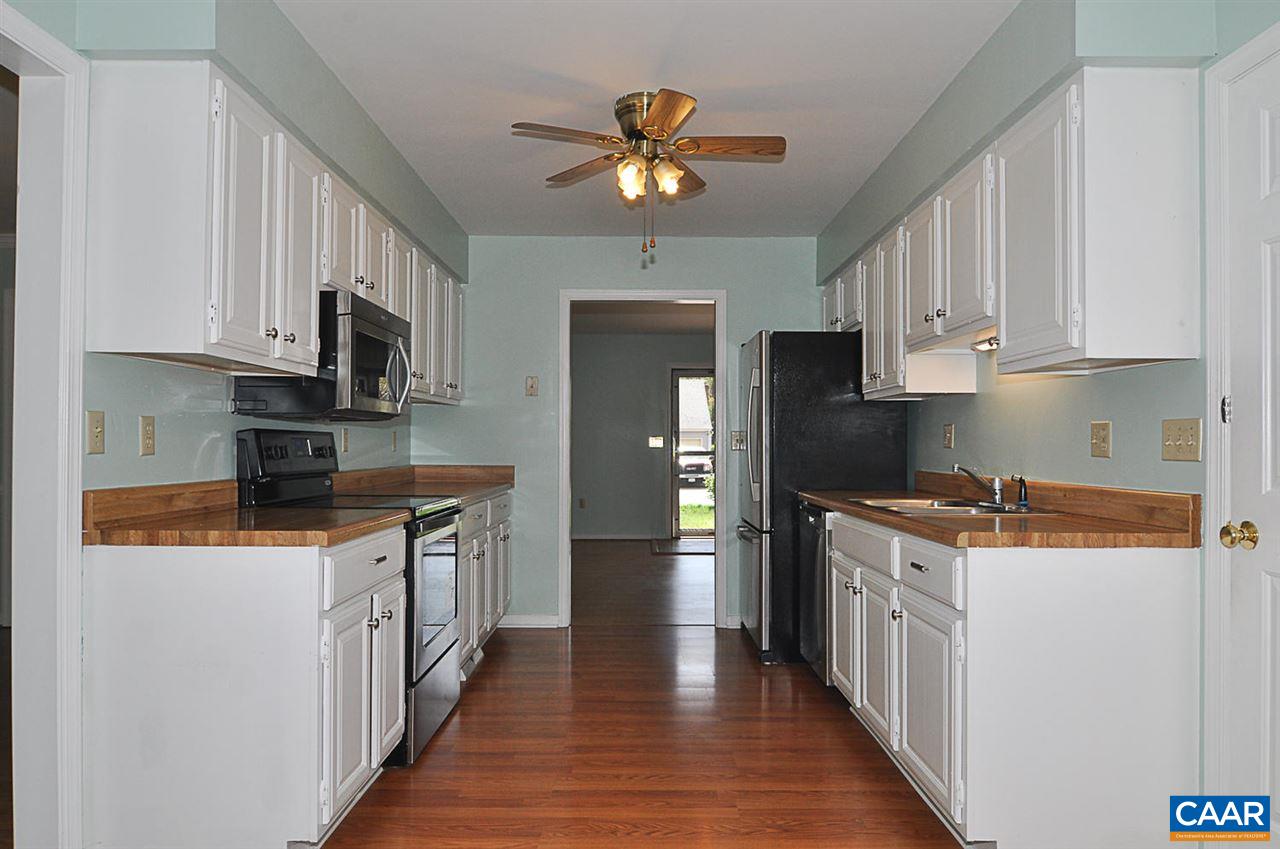 1576 Old Brook Road Charlottesville, VA 22901 - Photo 7 of 42 a kitchen with stainless steel appliances granite countertop a refrigerator a stove top oven a sink and dishwasher