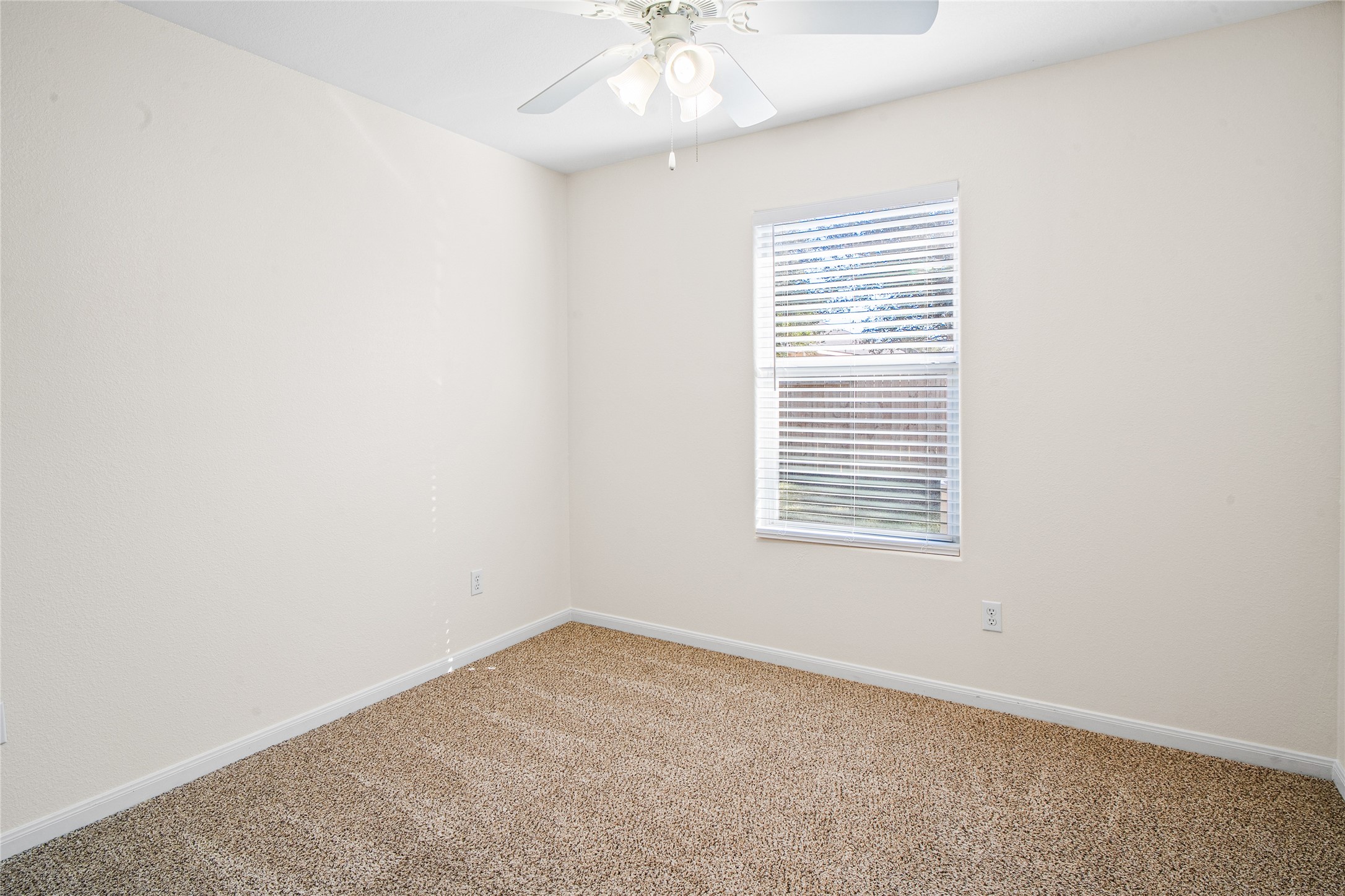 2224 Shady Tree Lane Conroe, TX 77301 - Photo 12 of 20 an empty room with a window