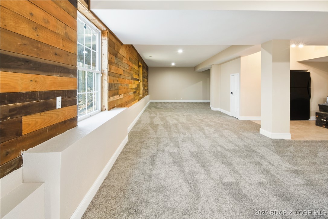 22 Navajo Road Four Seasons, MO 65049 - Photo 33 of 42 The downstairs offers space and tons of potential.