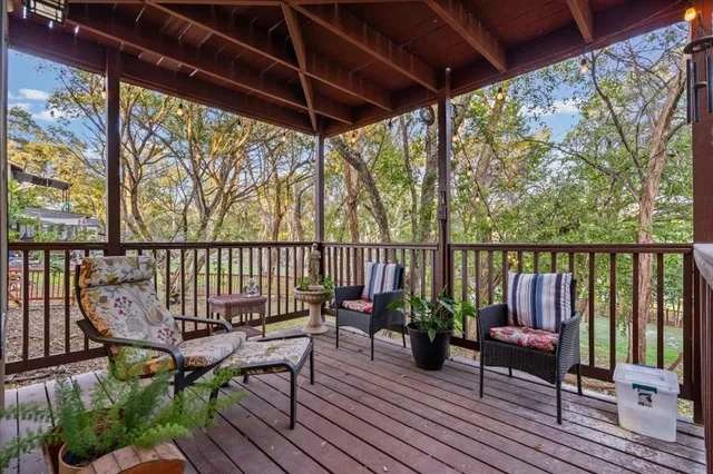 a view of a two chairs in the deck