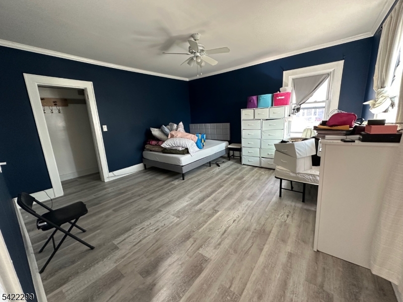 113 Pequannock Street Dover, NJ 07801 - Photo 12 of 17 a living room with furniture and a wooden floor
