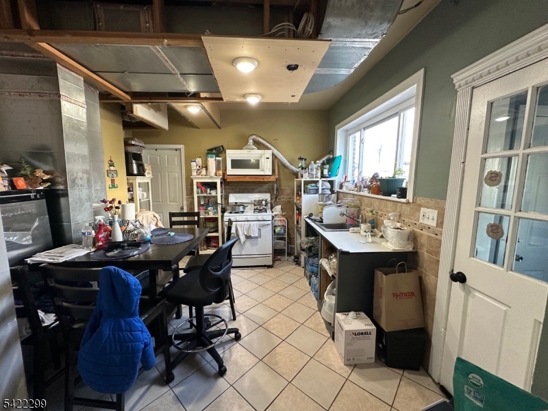 113 Pequannock Street Dover, NJ 07801 - Photo 7 of 17 a view of a dining room with furniture