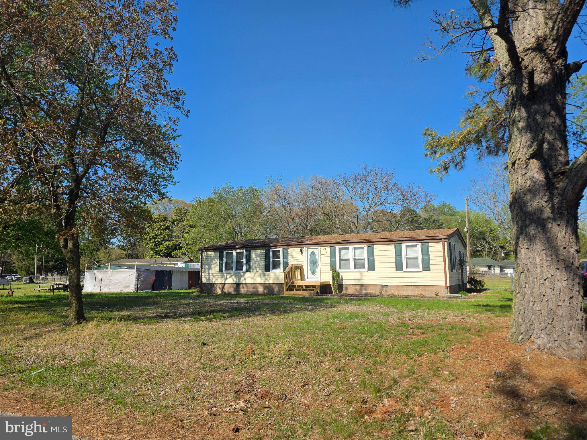 150 West Street Magnolia, DE 19962 - Photo 2 of 26 Charming home nestled in nature's embrace.